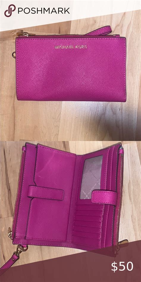 michael kors hot pink wallet.